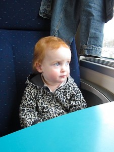Baby Z on the train to Lille in France which is about 50 miles from Ghent- Kid World Citizen